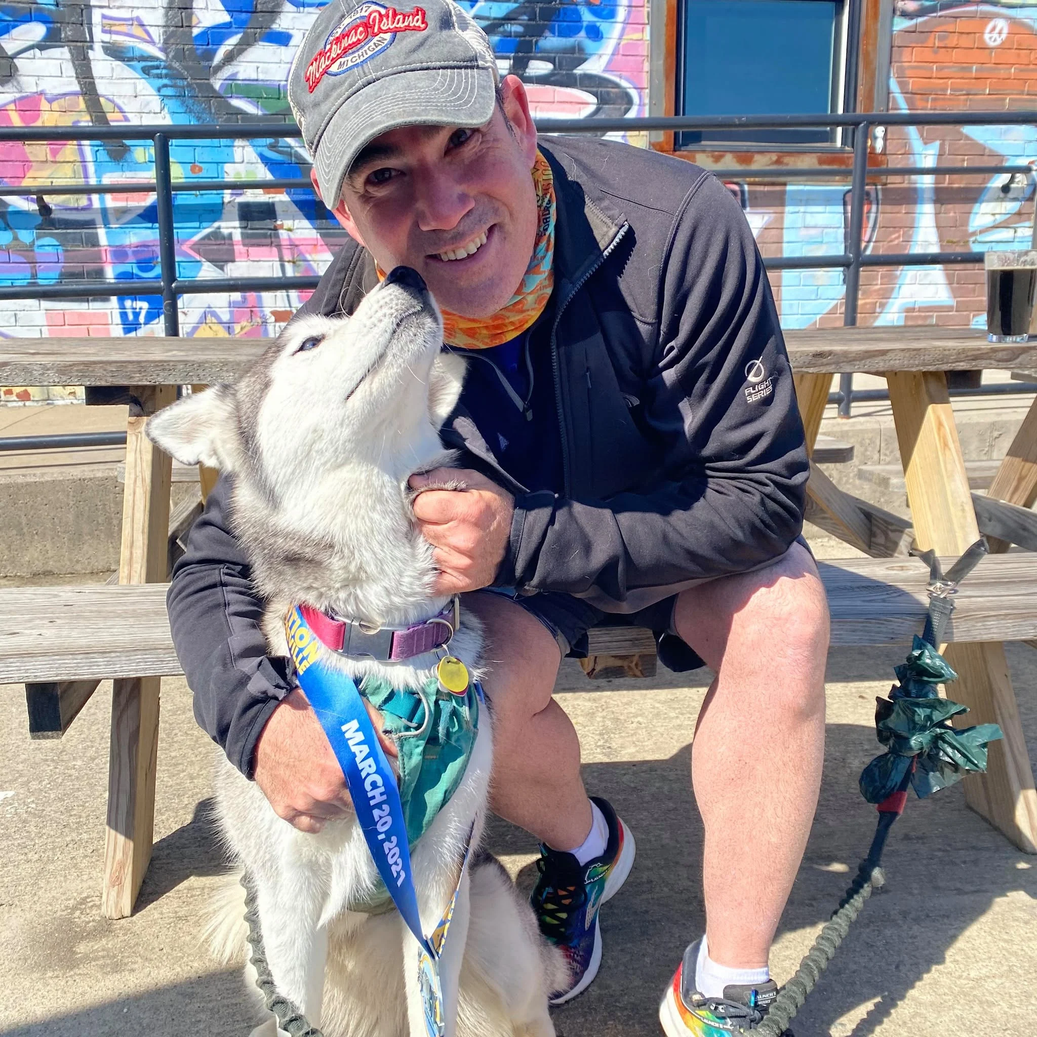 Brunswick Forest Real Estate Agent Seth Robbins with his dog