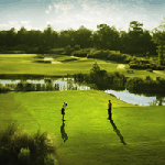 Two Golfers teeing off