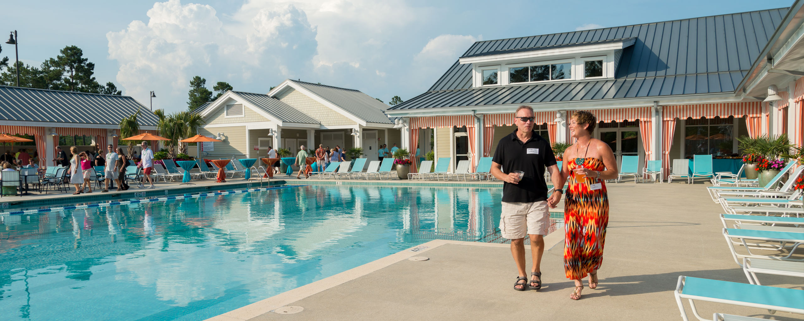 Brunswick Forest Pool - Couple Holding Hands