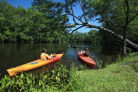 Two people kayaking at Brunswick Forest