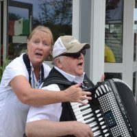 Man and women playing accordion