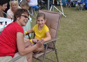 Mom and daughter enjoying activities at the Italian Festival