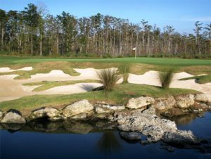 Water hazard and sand traps off the green