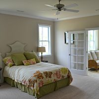 A bedroom of the Summerwind Villas at Brunswick Forest