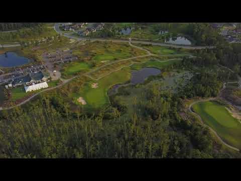 9th Hole, Clubhouse and Practice Greens at Sunset