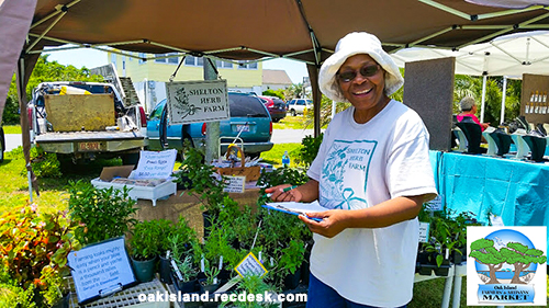 Vendor posing at the Oak Island Farmer's Market